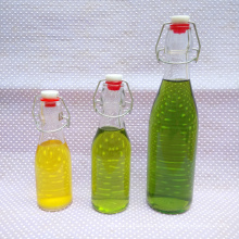 Round shape oil bottle,glass wine bottle with buckle lid